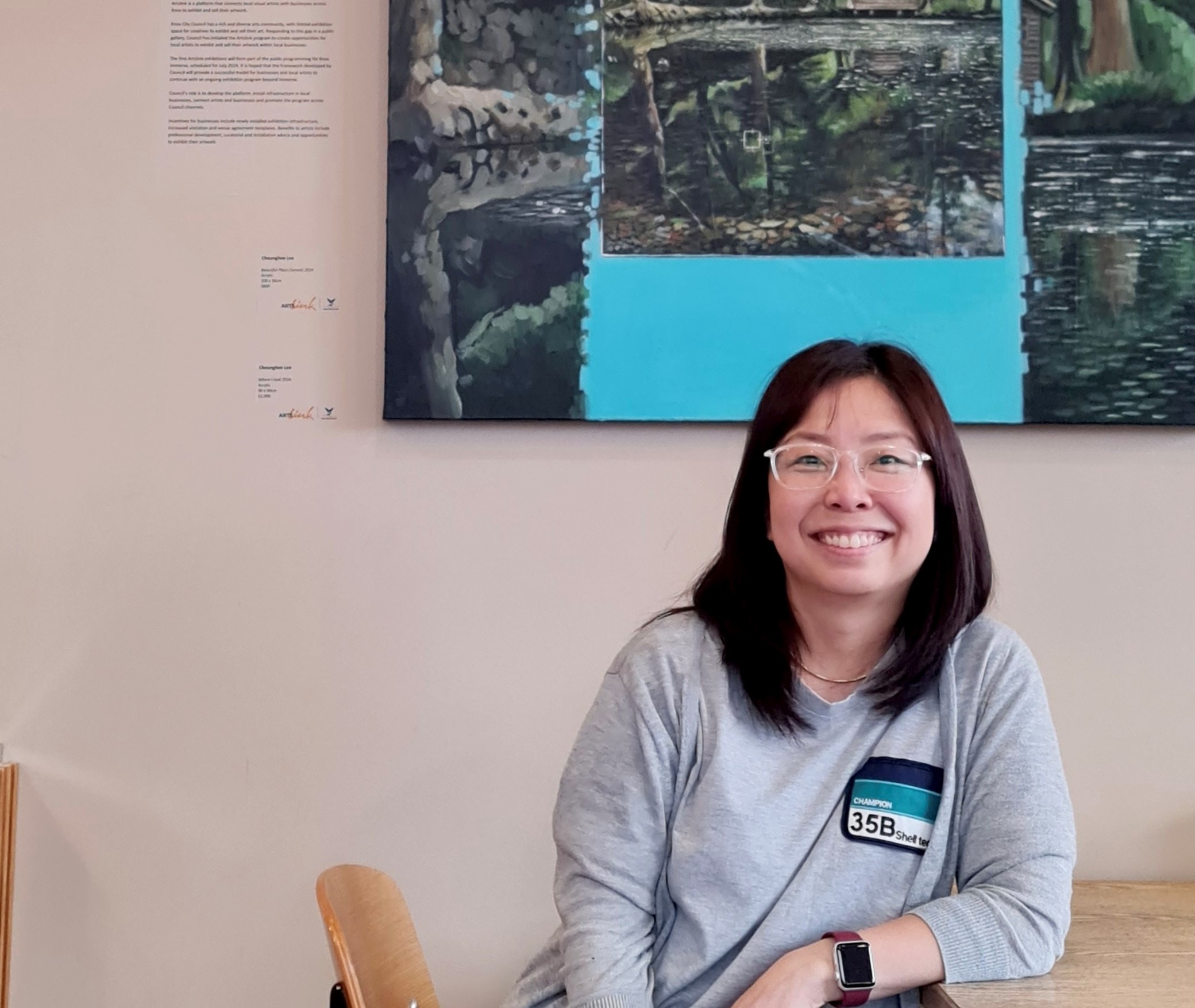 Seomog sitting at a table