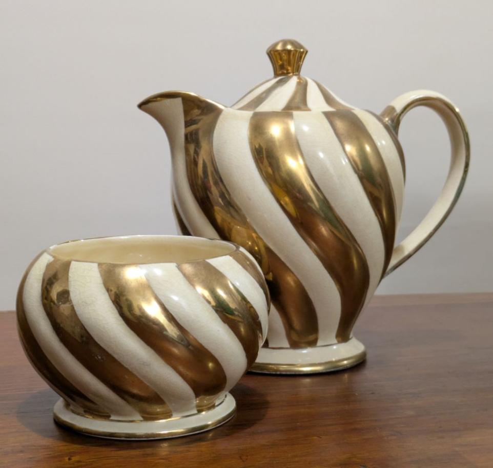 Gold and white striped teapot and sugar bowl