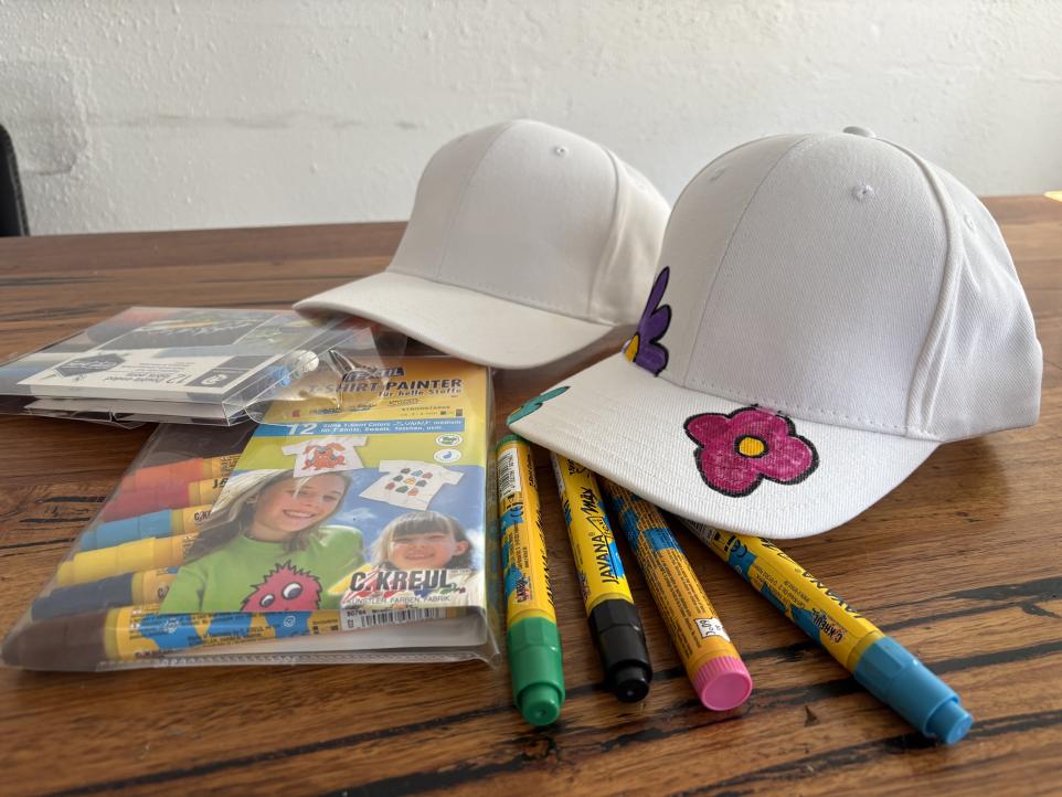 chilldren's art work on textile hats 