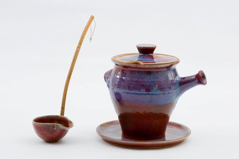 Artist made glazed ceramic soup ladle and tureen with spout.