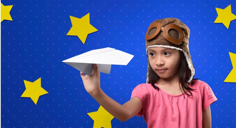 child with paper plane