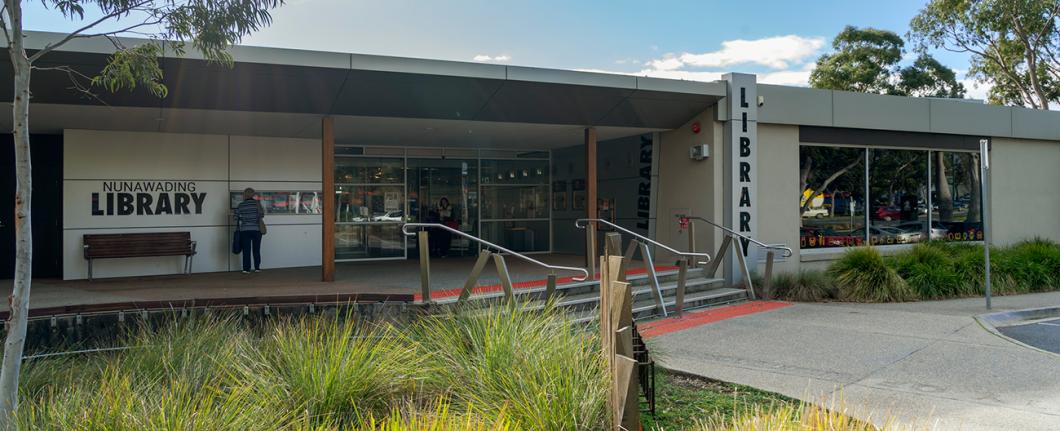 looking at the front entrance to the Nunawading library at the top of a set of stairs