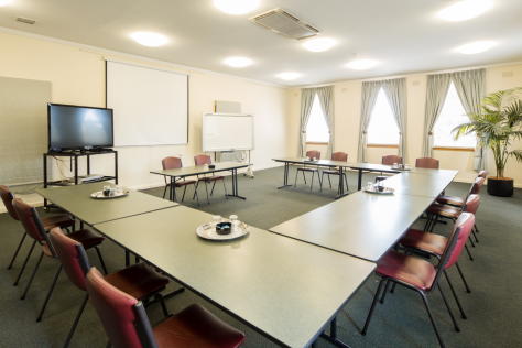 The Box Hill Town Hall's Boyland Room set up with chairs and tables in a U shape