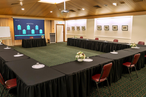 The Box Hill Town Hall's Matsudo Room set up with chairs and tables in a U shape