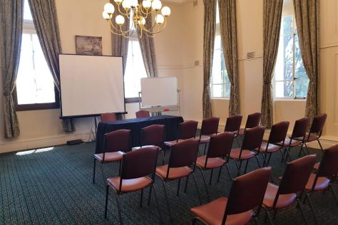 The Box Hill Town Hall's Padgham Room set up with chairs in a theatre setting