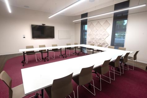 The Nunawading Community Hub's Meeting Room 4 set up with U shaped tables and chairs