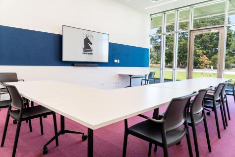 The Nunawading Community Hub's Studio 3 with a U shaped table and chairs