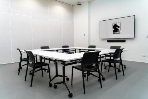 The Nunawading Community Hub's Studio 7 with a U shaped table and chairs