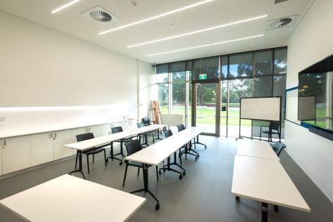 The Nunawading Community Hub's Studio 8 with tables and chairs