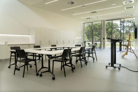 The Nunawading Community Hub's Studio 8 with a U shaped table and chairs