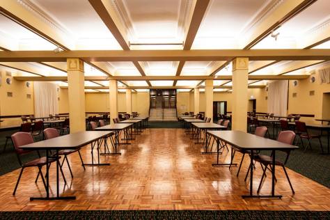 The Box Hill Town Hall's lower hall set up with chairs and tables