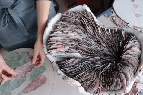 Amy Kennedy in the process of creating the work, Untamed – Bush Block 2017