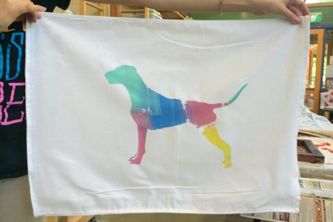 Screen print of a dog on a tea towel