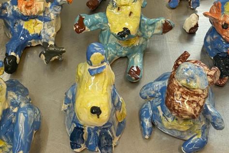 hand build ceramic dog man kids clay class