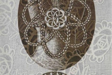 Artist linocut depicting the back of a woman's head with plaits. 