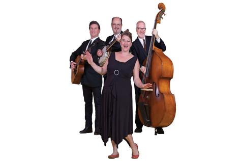 A old time folk band look happy. 