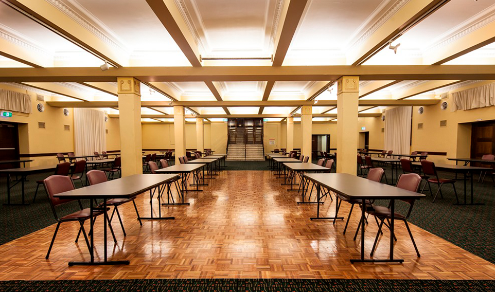 The Box Hill Town Hall's lower hall set up with chairs and tables