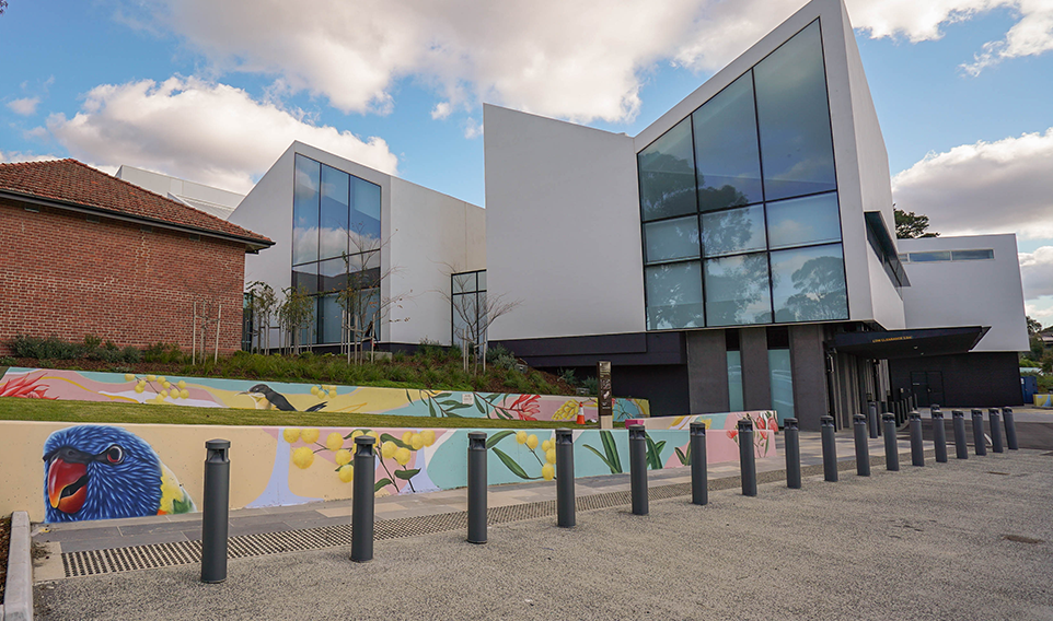 The Nunawading Community Hub's front exterior featuring colourful murals featuring local flora and fauna  