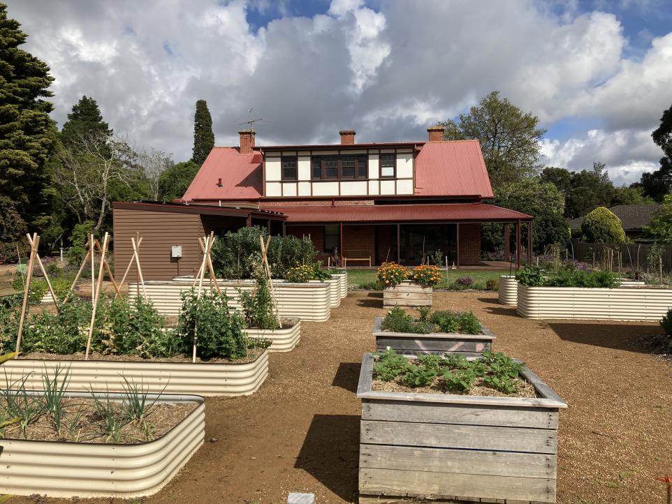 Picture of the back of Strathdon House and the vegetable garden